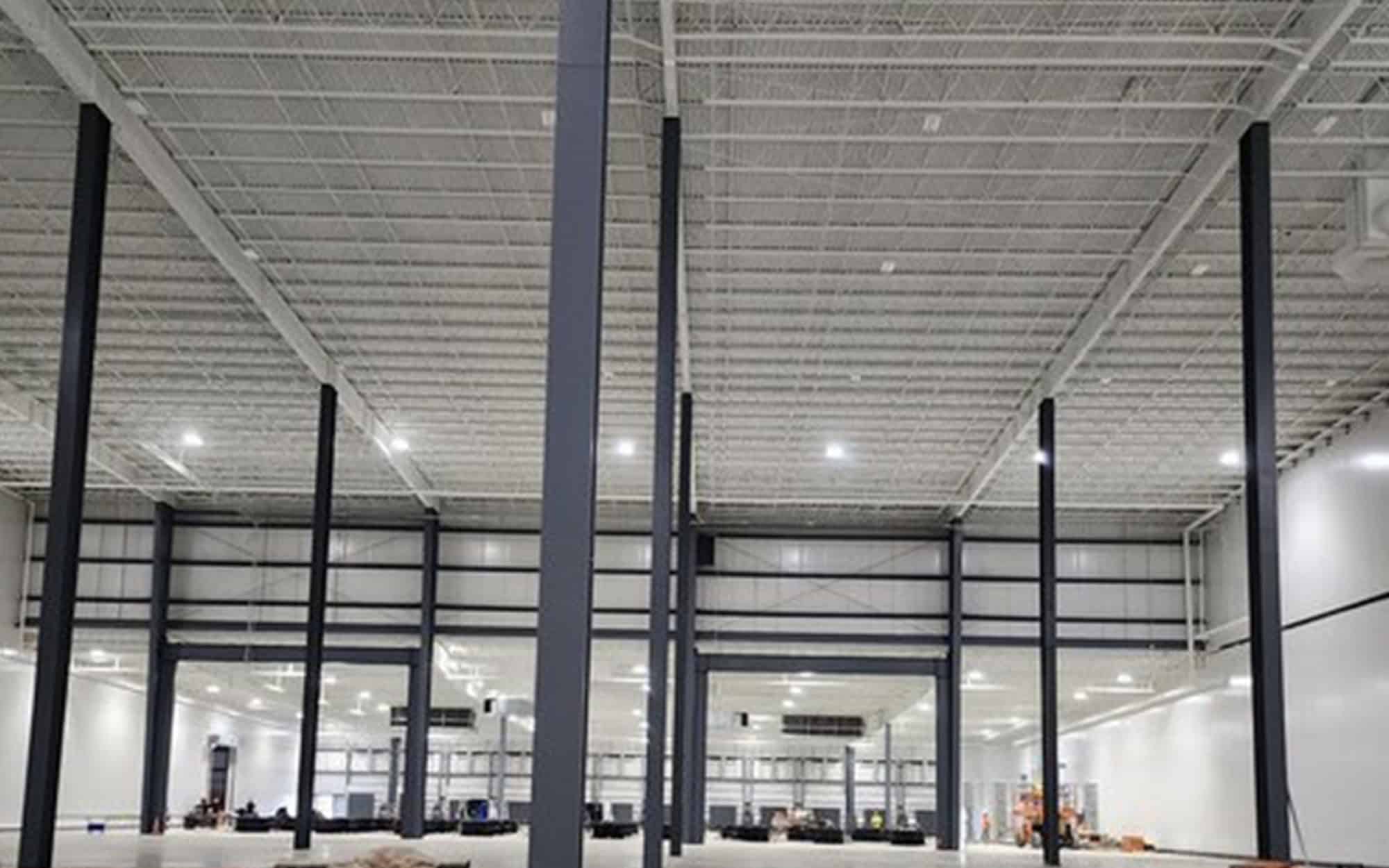 Large warehouse with black beams
